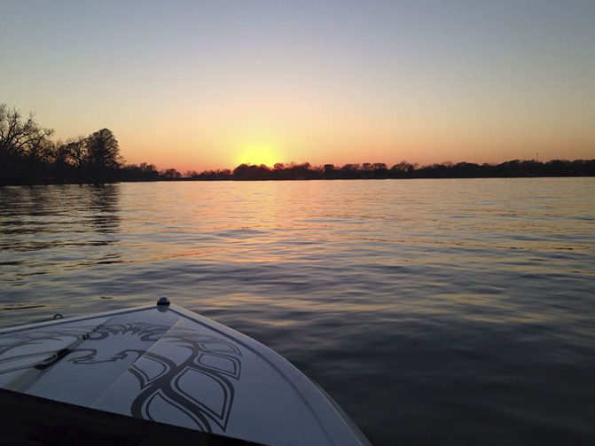 boat on water at sunset