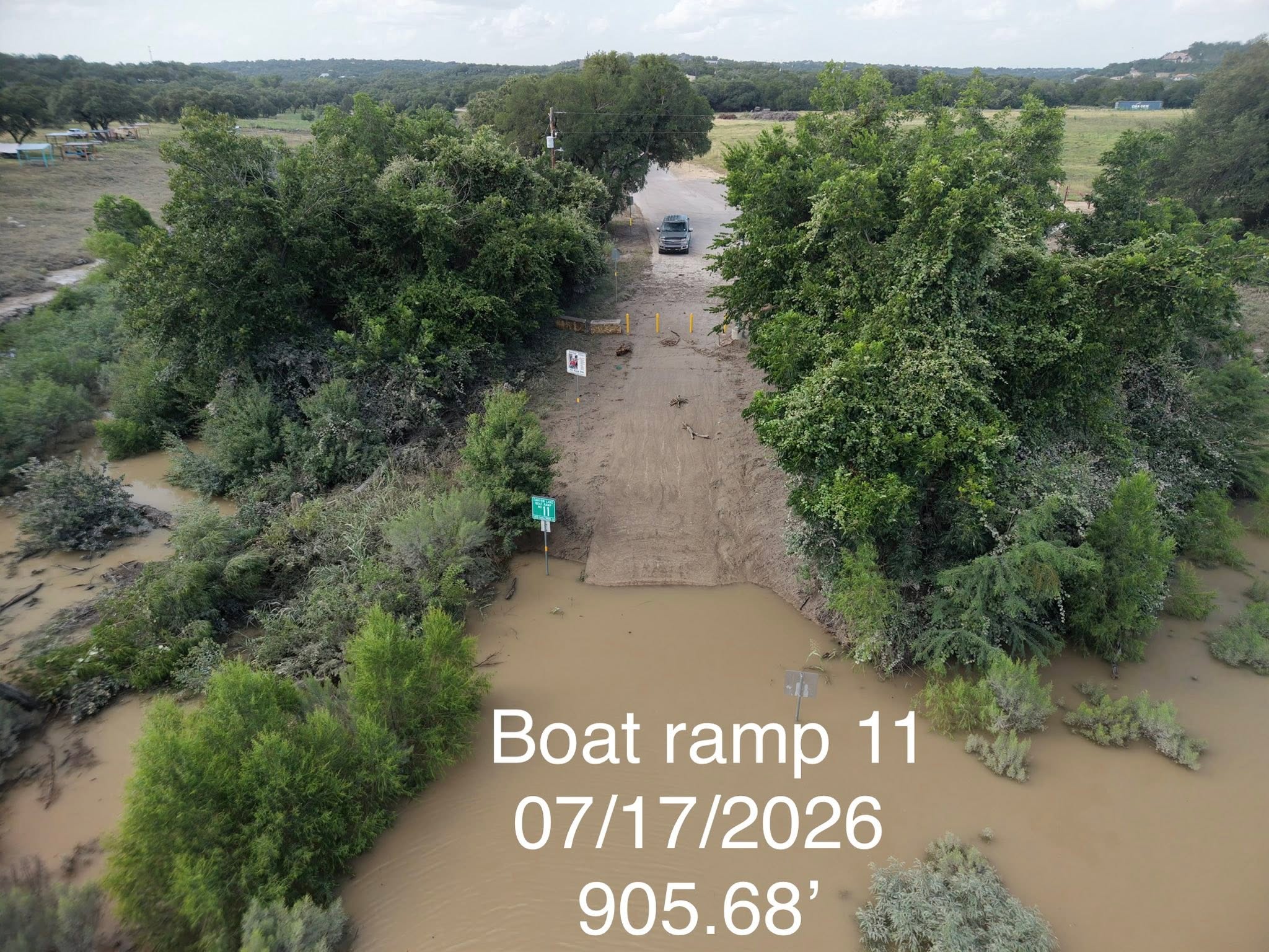 Canyon Lake Boat Ramp 11 on July 17 2026 with muddy flood water